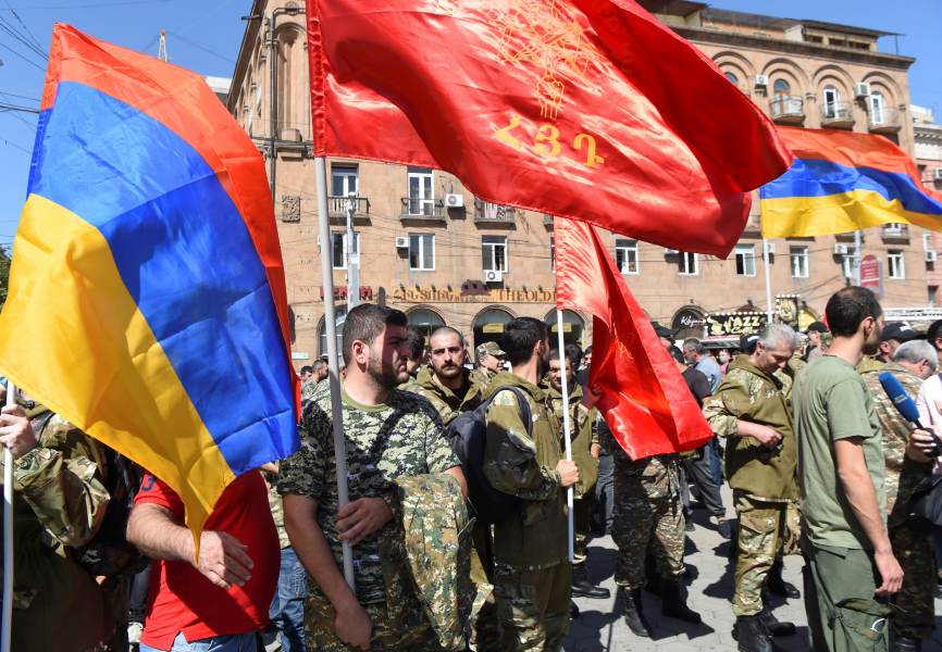 Armenian military volunteers gather in Yerevan after authorities declared martial law. REUTERS.