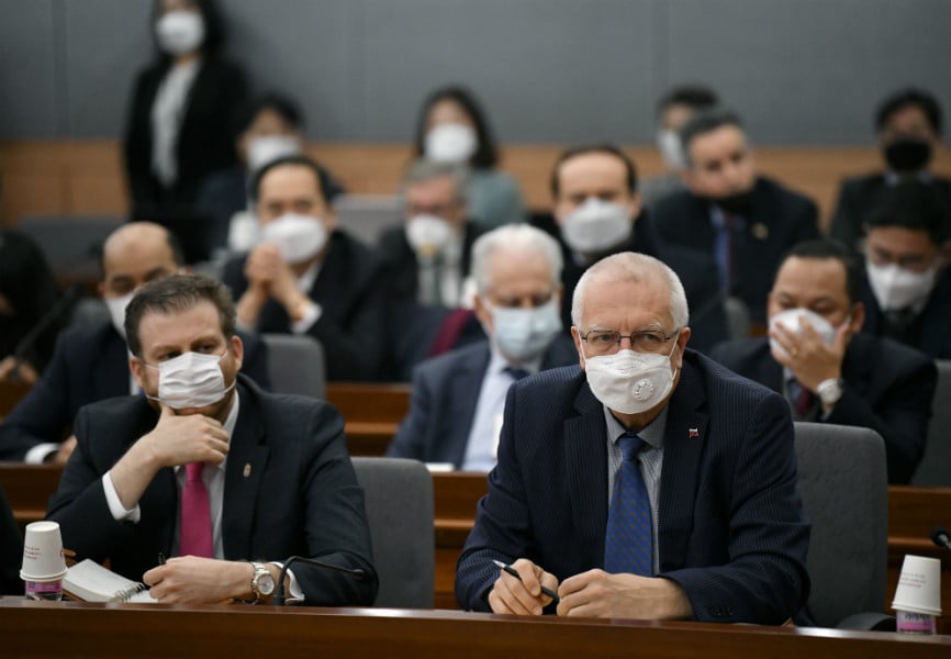 Foreign diplomats attend a briefing on coronavirus by South Korean Foreign Minister Kang Kyung-wha. REUTERS.